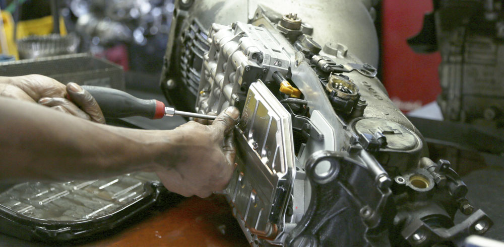 Mechanic Working on a Transmission