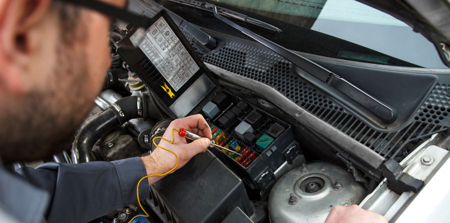 Technician running an electrical diagnosis